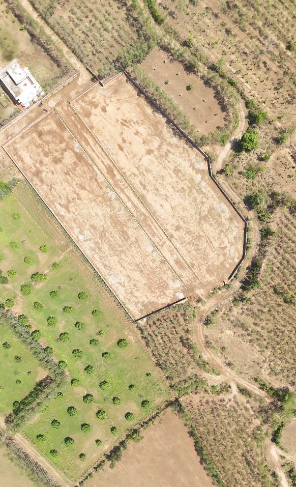 Drone view of plot divisions and internal path